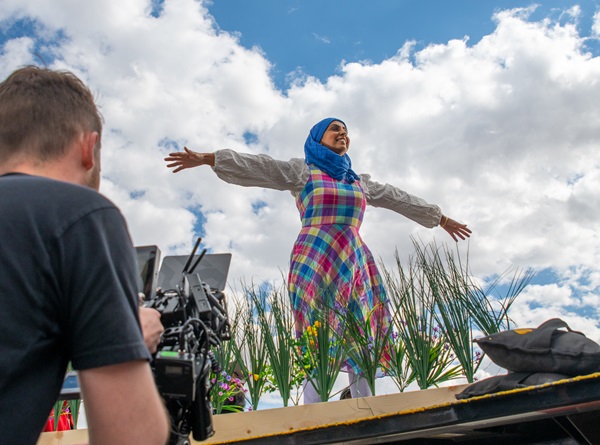A man films a Muslim actress.